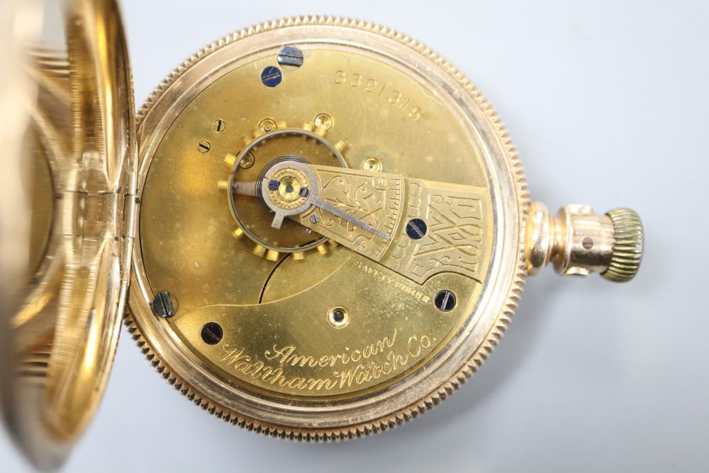 An American 14k yellow metal Waltham hunter keyless pocket watch with Roman dial and subsidiary seconds,